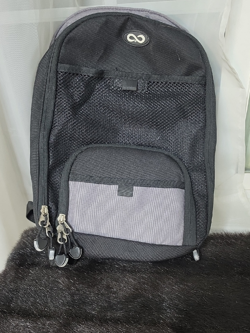 Moog Medical Black and Gray Compact Backpack.
